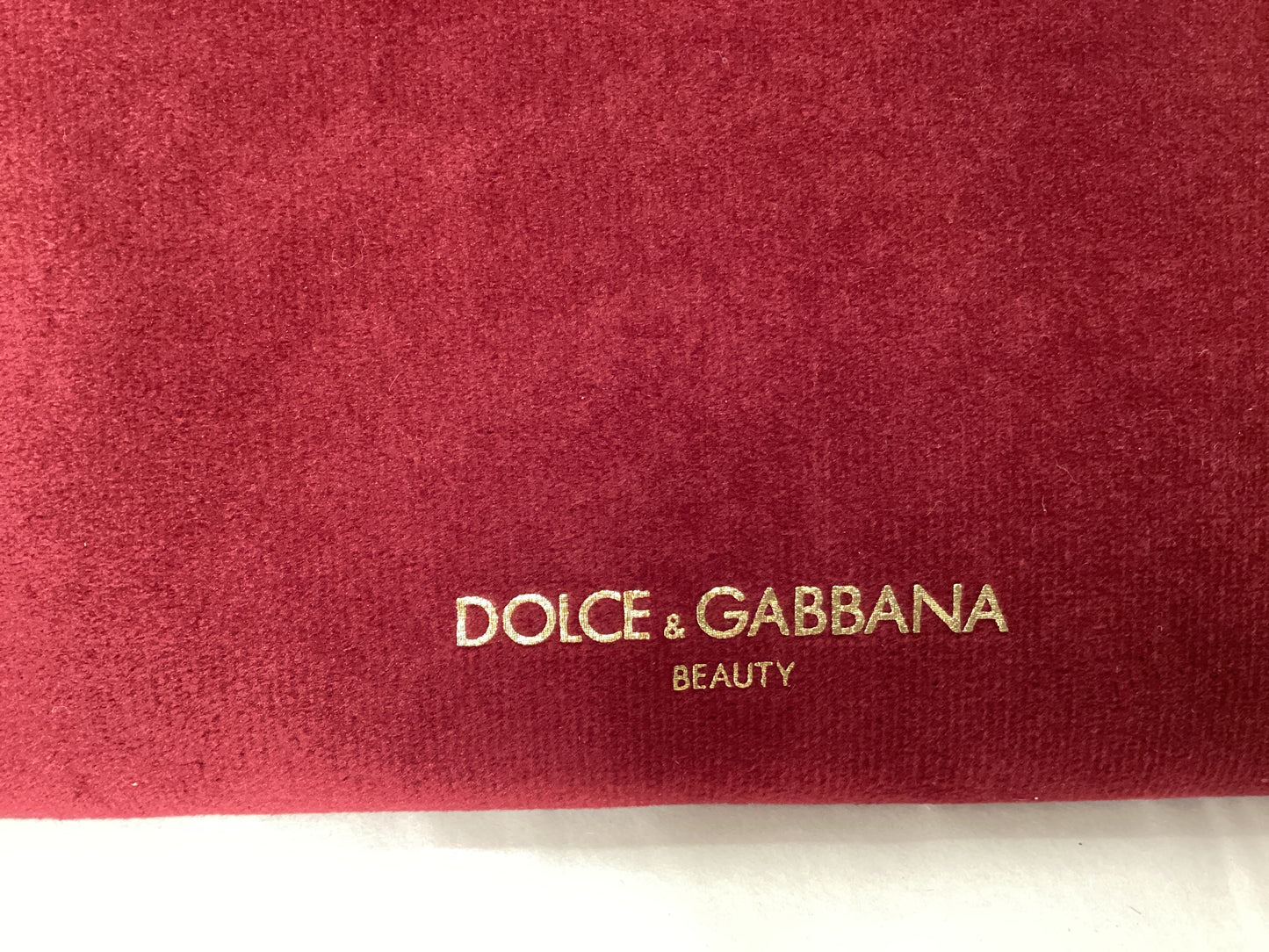 Dolce and Gabbana new cosmetic bag burgundy with black box
