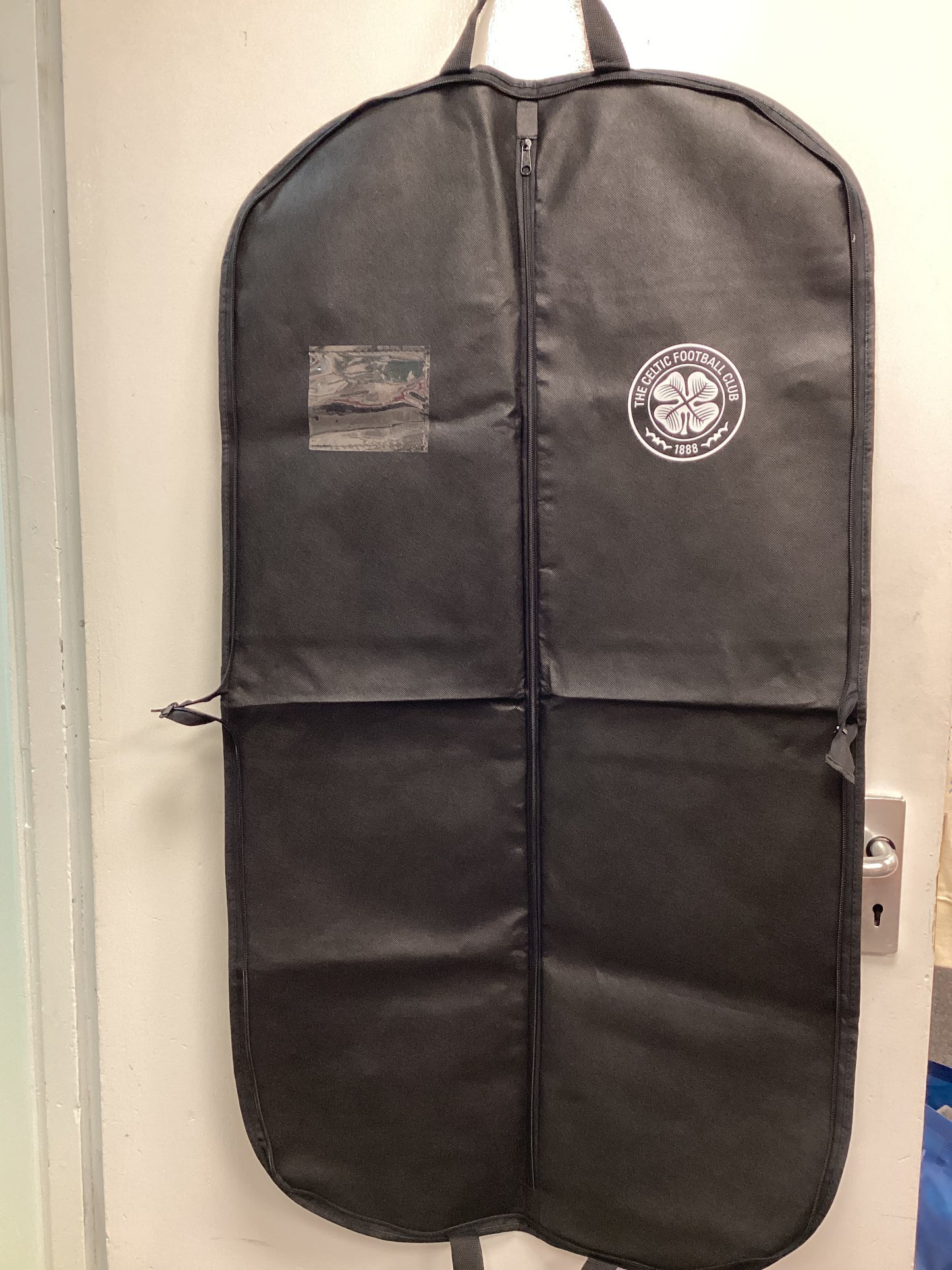 Celtic Hospitality Gifts from Celtic FC vs Livingston FC Match 11/02/2026. 2x Programmes, 2x Suit Carriers, 1x Laptop Bag, 1x Menu