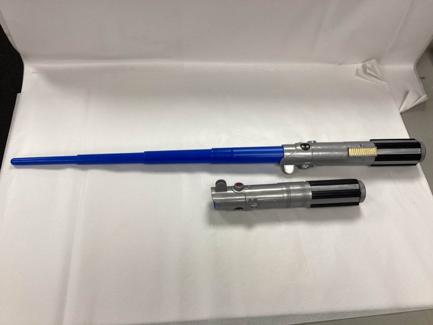 Set of 2 new blue extendable lightsabers from StarWars