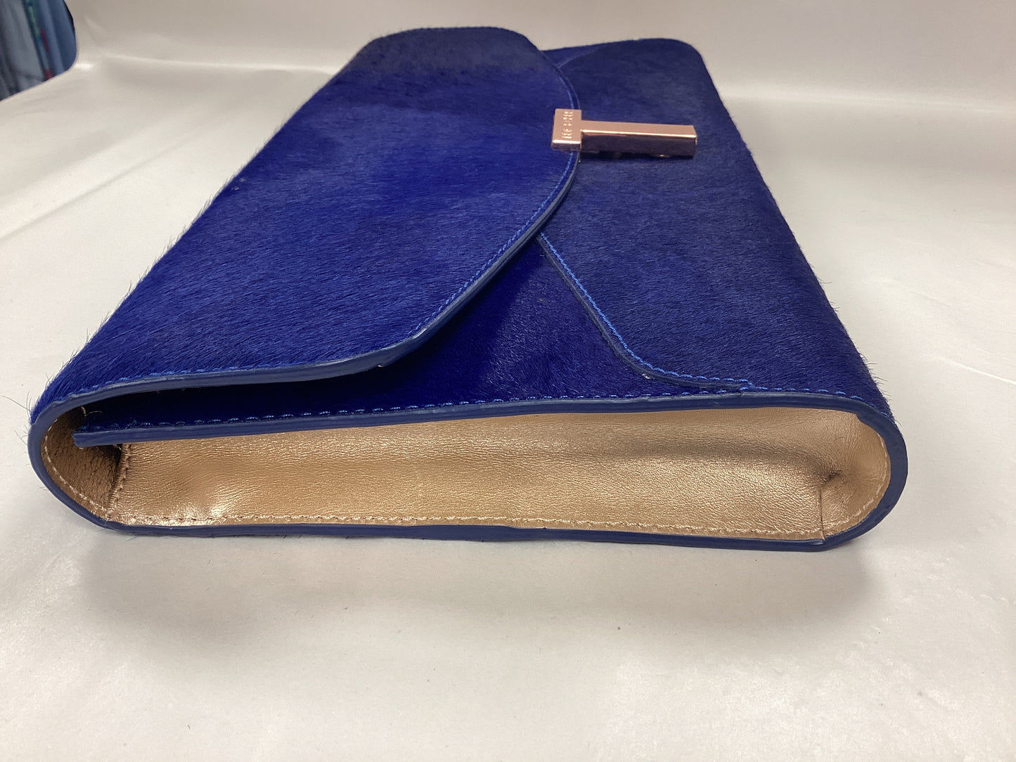 Blue Ted Baker Clutch Bag, Pony Hair, Gold Accents and Dog printed material inside lining