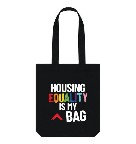 Black Housing Equality is my Bag Black Tote Bag, with white bold lettering, the word equality is in the LGBTQ+ flag colours