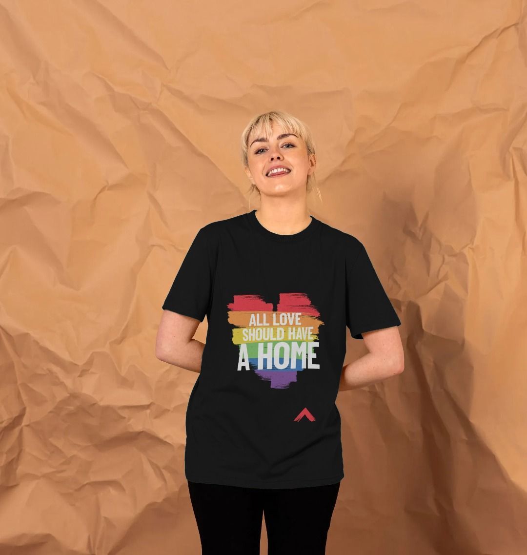 All Love Should Have a Home Black T-shirt, LGBTQ+ flag colour heart with white text slogan "All love should have a home"
