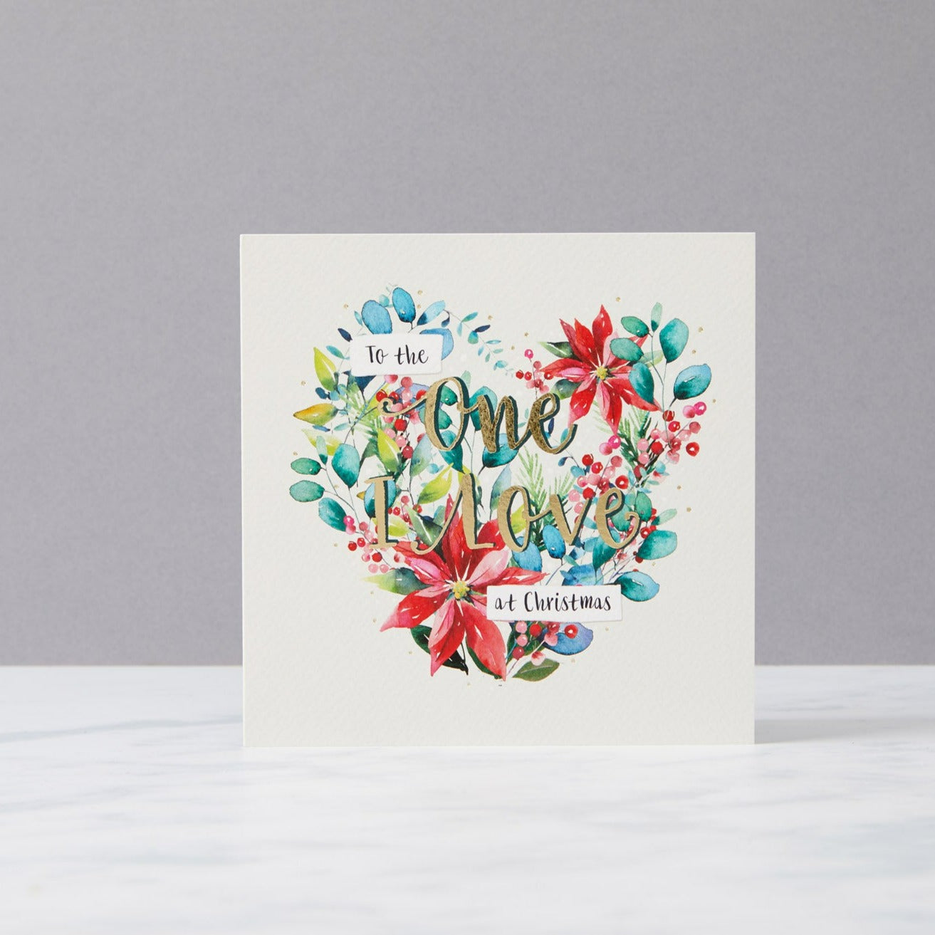 Floral heart card reads "to the one I love at Christmas"
